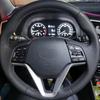 Aplicable a Tucson moderno cubierta de volante cosida a mano de cuero especial para las cuatro estaciones fabricantes de cubiertas de volante GM