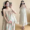 Vestido de maternidad Verano Perezoso Floral Patchwork Malla Falda de tirantes Tela Baijia Falda floral Conjunto de dos piezas