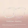 Nuevo brazalete de corazón con lazo, estilo coreano, lujo ligero, diseño de nicho, irradia una sensación de alta gama, joyería con forma de corazón de circonita cúbica rosa, un regalo perfecto para tu novia