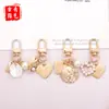 Llavero con Forma de Corazón de Concha de Perla Creativo Llavero de Concha Caracola Pequeño Regalo Ins Colgante Pequeño