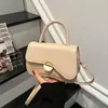Bolsa de Mão Nova Estilo Primavera/Verão 2026 Leve Luxuosa Simples Versátil Casual Elegante para o Dia a Dia Ombro Transversal
