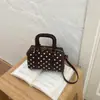 Bolso coreano de nicho de lunares para mujer, nuevo bolso cruzado versátil 2026, bolso de mano de alta gama, bolso almohada, bolso cilíndrico