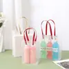 Bolsa de mano transparente de PP esmerilado con asa de papel kraft, bolsa de regalo para productos cosméticos y de cuidado de la piel, bolsa de embalaje para regalos y recuerdos