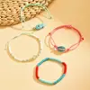 Conjunto de Pulseras Apilables Estilo Divertido de Vacaciones Transfronterizas Europeas y Americanas Pulsera Trenzada de Concha Perla Pescado Cerámico de Color Contrastante Goteando Aceite