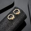Ano da Serpente Este Ano da Vida Brincos Masculinos Novo Senso de Design Zircônia Micro-cravada Formato de Serpente Exquisitos Moda Luxo Leve Brincos Femininos Atacado