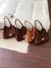 Bolso Retro Simple Estampado de Leopardo para Mujer 2026 Nueva Moda Popular Bolso de Hombro Casual Gran Capacidad Bolso Tote para el Trabajo