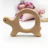 Suministro directo de fábrica palo para morder dientes de bebé Madera de haya diente calmar forma de animal palo para morder dientes morder música