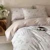 Juego de ropa de cama de cuatro piezas de algodón de fibra larga de 60 hilos, funda de edredón y sábana de algodón 100% jacquard, impresión digital, tacto de alta gama para dormitorio principal