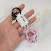 Colgante Llavero de Cuerda Exquisito Tejido a Mano con Logo Personalizado, Llavero de Cuero Genuino para Coche, Pequeño Regalo Universal al por Mayor