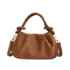Exquisito bolso retro de gamuza de nicho para mujer, nuevo modelo 2026, bolso cruzado casual versátil, bolso de mano pequeño súper popular