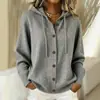 Cardigã suéter de tricô com capuz e botões estilo europeu e americano 2026, nova coleção outono/inverno, cor sólida, vestuário feminino casual e moderno para vendas transfronteiriças