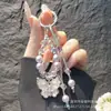 Colgante para Teléfono Estilo Coreano Mariposa de Goma Cadena de Perlas Llavero de Cristal de Nicho Creativo Colgante para Bolso Cadena para Teléfono