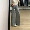 Jeans lavados vintage estilo "old money" americano para mujer, principios de otoño 2026, pantalones grises de pierna ancha adelgazantes, pantalones casuales versátiles