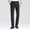 Pantalones Casuales de Negocios para Hombre Otoño/Invierno 2026 Estilo Nuevo Gruesos con Forro Polar Sueltos de Pierna Recta Pantalones Formales de Vestir Profesionales