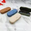 Estuche metálico para gafas de miopía, cuero de alta gama, antipresión, fresco y simple, almacenamiento portátil para gafas