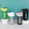 Nueva botella de agua deportiva portátil de 500 ml para fitness, vaso mezclador de proteína en polvo, vaso mezclador transparente, en stock para venta al por mayor
