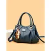 Bolsas femininas transfronteiriças 2026 novo modelo bolsa tote de grande capacidade versão coreana bolsa de ombro versátil para mães de meia-idade bolsa transversal