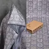 Tejido jacquard de rombos con diseños florales de corte, tejido para vestidos de primavera y otoño, material decorativo de diseñador