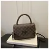 Nova Bolsa de Ombro 2026 Nova Coleção Primavera/Verão Design de Nicho Bolsa Transversal Moda Simples Bolsa de Mão Tendência Bolsa Feminina