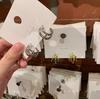 Pendientes de botón de estilo frío de alta calidad en plata s925, nuevos y modernos, estilo retro de Hong Kong, Corea del Sur, elegantes celebridades de Internet.