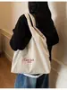 Bolso Texturizado Estilo Coreano Transfronterizo Estilo Perezoso 2025 Nuevo Gran Capacidad Casual Invierno Rayado Bordado Bolso de Hombro