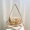 Bolso de mujer de alta gama de nicho 2026 nuevo bolso cruzado bordado de moda, bolso de hombro y axila exquisito súper popular