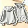 Sudadera con capucha de moda para niños y niñas de primavera y otoño, chaqueta casual de color liso con cremallera, sudadera moderna para niños mayores