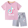 Camiseta infantil 2022 TikTok verão nova vestuário infantil de comércio exterior roupas infantis coreanas calça de manga curta terno de duas peças