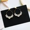 Pendientes de perla de aguja de plata S925 de Corea del Sur para mujer, pendientes largos de aro, pendientes de moda personalizados con cara de perla para adelgazar, pendientes pendientes