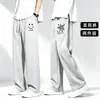 Pantalones rectos casuales versátiles estampados divertidos para estudiantes y jóvenes de primavera y otoño, pantalones anchos holgados y fluidos, pantalones deportivos