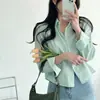 Estilo coreano Coreia do Sul camisa chique Feminino Primavera e Outono senso de design nicho solta pequena blusa de top nicho alta sensação