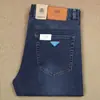 Calça Masculina Fina Azul Branca Lavada Nova para Primavera e Verão Fibra de Poliéster Solta Reta Stretch Jeans Masculino