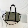 Bolsa de Lona Casual de Gran Capacidad para Mujer 2026 Nueva Ligera Versátil para Viajes Diarios Hombro Cruzado Bolso Tote de Moda
