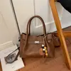 Moda coreana Elegante Chic Sencillo para ir al trabajo Otoño 2026 Nueva Llegada Personalidad Bolso de Hombro Cruzado de Mano para Mujer