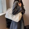 Bolsa de lona de grande capacidade para mulheres 2023 Nova bolsa de roupas de trabalho casual coreana Bolsa de nicho Design de moda Bolsa de axila
