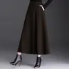 Saia de Lã Elegante Linha A Feminina 2026 Outono/Inverno Nova Cintura Alta Versátil Longa Elegante Cobre o Quadril Bainha Larga