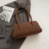 Bolso pequeño retro transfronterizo de otoño e invierno para mujer 2024 Nueva llegada Moda que combina con todo Bolso de hombro bajo el brazo Supercaliente Bolso baguette portátil