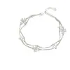 Pulsera de Doble Capa con Trébol de Cuatro Hojas Estilo Lujo Ligero Europeo 2026 para Mujer Moda de Nicho Temperamento Versátil Joyería de Mano Regalo
