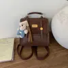 Mochila de Viagem Estilo Britânico Transfronteiriça Retro Versátil Nicho Design de Mochila Bolsa Moda Passeio Portátil Mochila Escolar