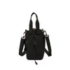 Nueva bolsa de hombro deportiva transfronteriza, bolso tipo cubo con cordón estilo coreano, bolso versátil y moderno de un solo hombro cruzado