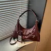 Nueva bolsa de hombro/axila de diseño de nicho de moda versátil transfronteriza, bolsa cruzada de alta gama de gran capacidad, bolsa de albóndiga para commuter