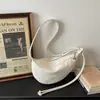 Bolso de mujer de cuero suave de alta calidad, gran capacidad, nuevo bolso cruzado versátil de moda 2026, bolso tipo saddle de albóndiga para el trabajo