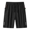 Pantalones cortos casuales para hombre directo de fábrica, pantalones de moda de cinco puntos, con cremallera, pantalones cortos holgados, pantalones deportivos finos de verano