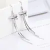 Auténtico cobre plateado versión coreana del nuevo pendiente de gancho con borla pequeña de temperamento femenino comercio electrónico transmisión en vivo suministro de fábrica venta al por mayor