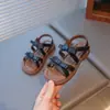 Sandalias para Niña 2025 Verano Nuevo Estilo Zapatos de Princesa con Lazo para Niña Pequeña Estilo Coreano Para Niños Pequeños Bebé Modernos Zapatos de Playa