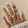Conjunto de Anillos de Serpiente Retorcida Multiarcticulares de Nuevo Estilo Transfronterizo con Sentido de Diseño, Anillo Abierto de Perla, Conjunto de Veintitrés Piezas