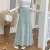 Elegante falda larga de punto grueso para mujer, de cintura alta, con diseño calado, adelgazante, de otoño, color gris, con caída elegante