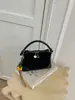 Bolso de mano de diseño retro transfronterizo para mujer, nuevo bolso de nicho de alta moda para el día a día, bolso de hombro y cruzado elegante y versátil