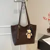 Bolsas tote retrô estilo coreano para atacado para mulheres, nova coleção outono 2026, bolsas de ombro tecidas de cor sólida, adequadas para o trabalho e uso diário