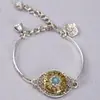 Pulsera de aleación de estilo étnico chino, accesorio metálico de nicho con flor de loto y sensación de alta gama, decoración al por mayor
